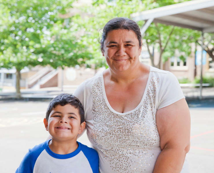 a-mum-picking-up-her-child-from-a-northcott-outside-school-hours-care