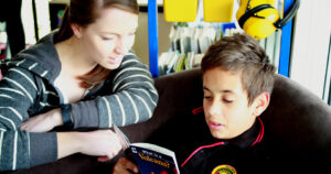 Northcott's Occupational Therapist Anna Francis working with an Aboriginal student from Jarjum College in Redfern