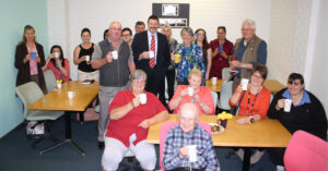 Queanbeyan Northcott staff and customers with Dr Mike Kelly campaigning for an NDIS