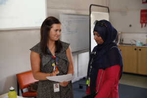 A Northcott customer giving feedback to a Northcott staff member.