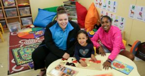 Kelly and her daughter Jameka with a Northcott support worker