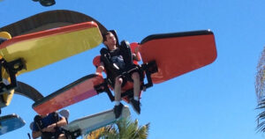 Northcott customer Travis riding a rollercoaster