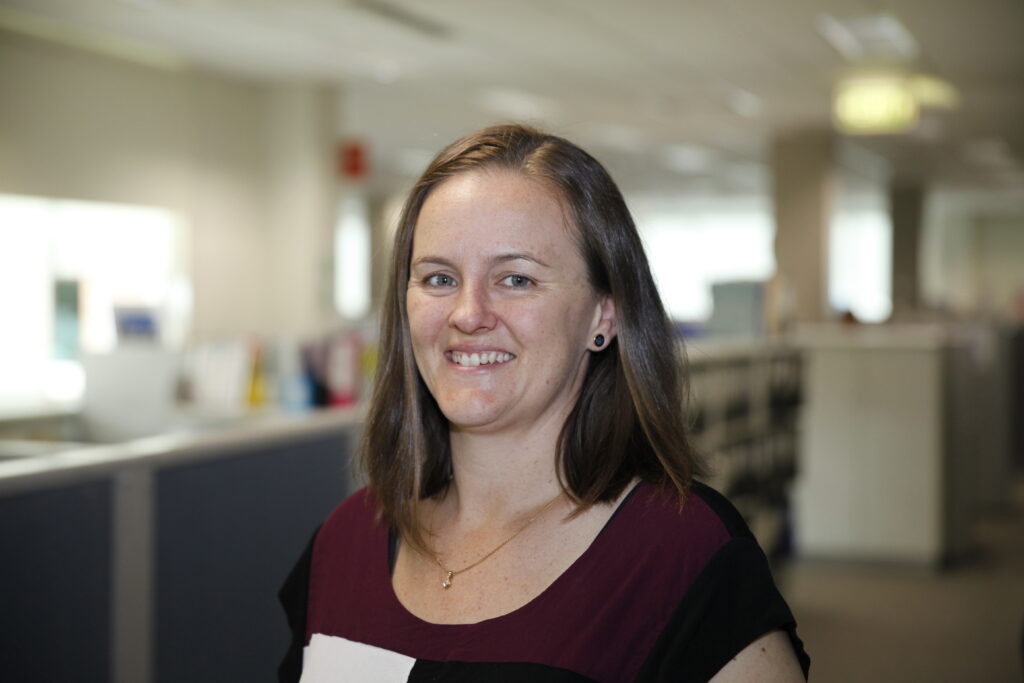 Northcott staff member Sam Frain smiling at the camera