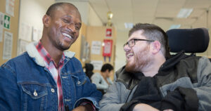 Support Worker Wilmot smiling with Northcott customer