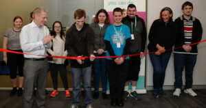 Northcott Penrith customers cutting ribbon at office opening
