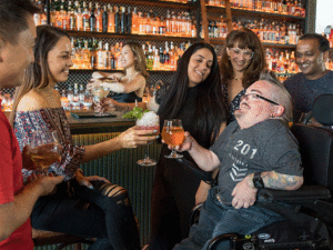 group of adult friends at a bar