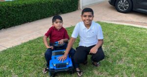 Two young boys smiling