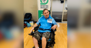 Male in wheelchair smiling