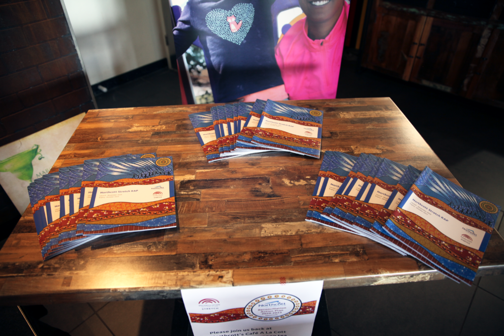 Hard copies of Northcott's Stretch RAP on a conference table