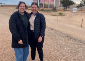 Two therapists standing in the dirt