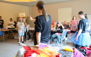 people making costumes