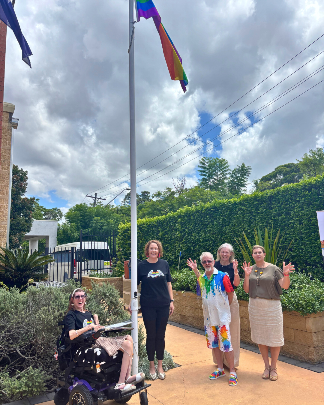 People raising flag