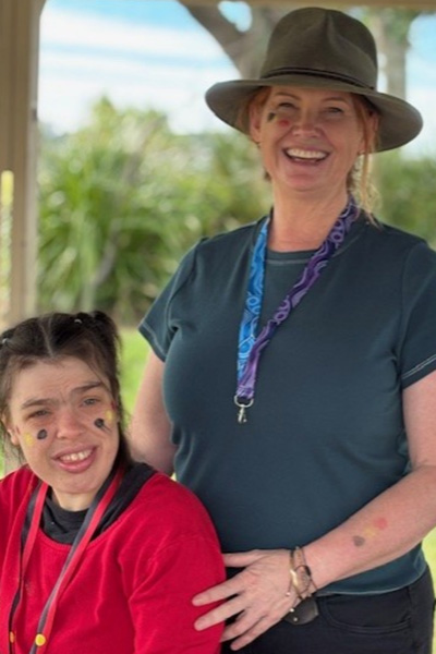 Two people are smiling at the camera at Ballina Community Day